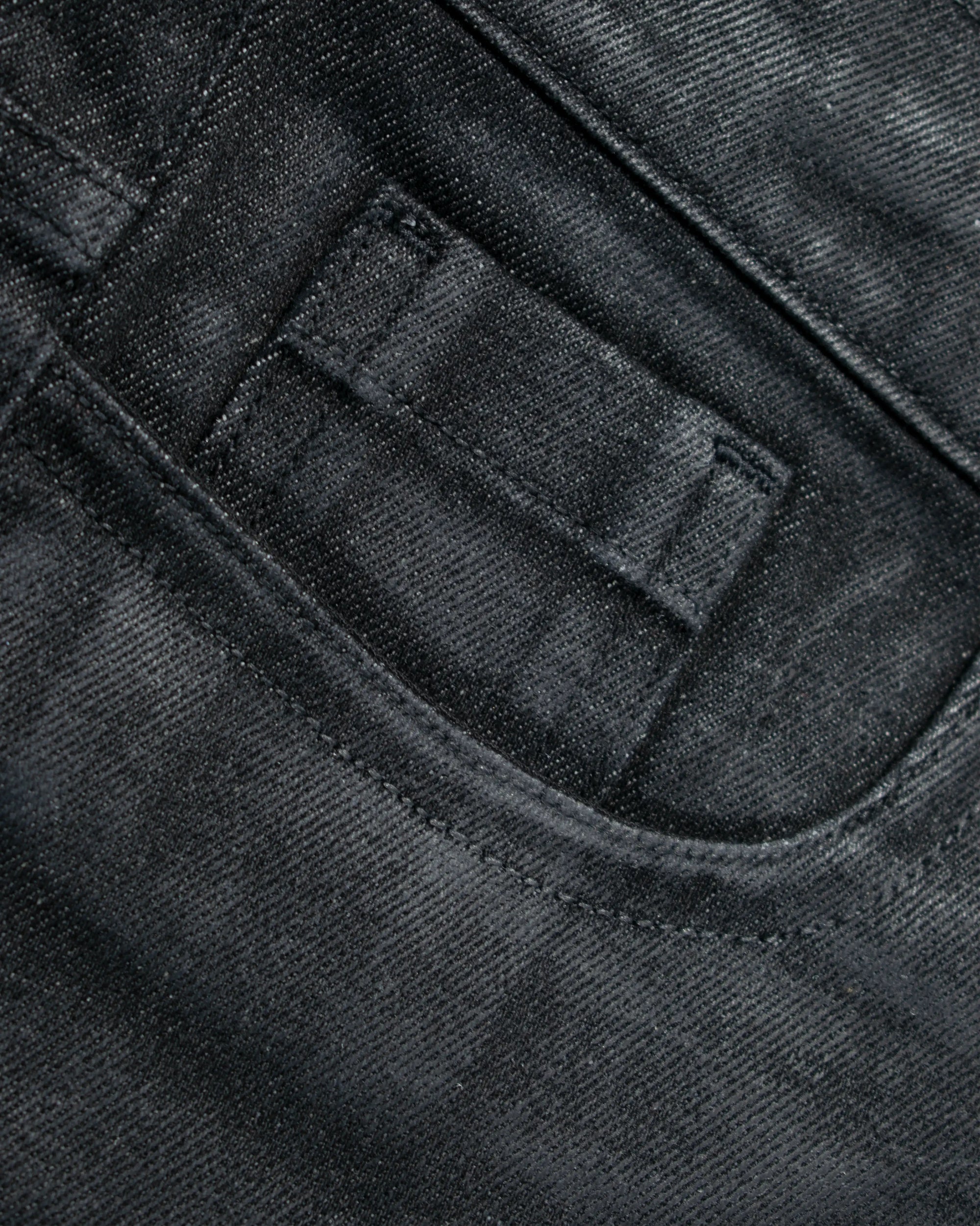 WAXED STACKED JEANS